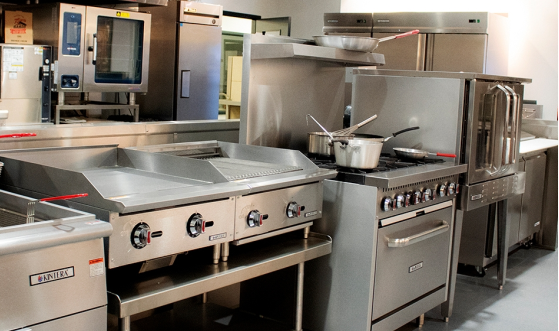 ovens with cookings pans on the burners