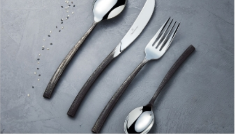 spoon, knife, fork on a table